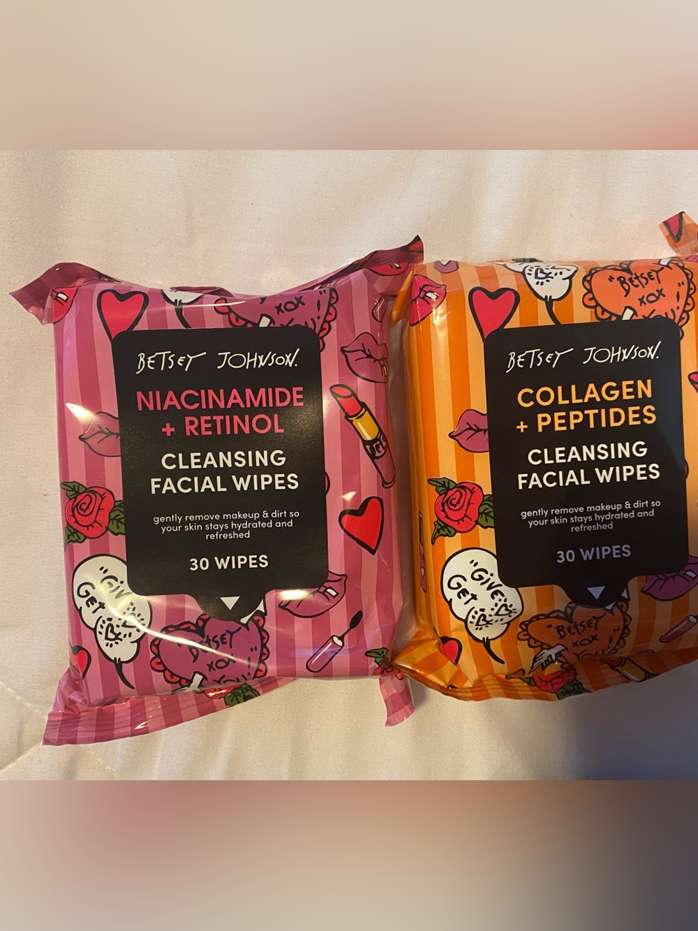 2 Betsey Johnson Niacinamide + Retinol Cleansing Facial Wipes — Pink